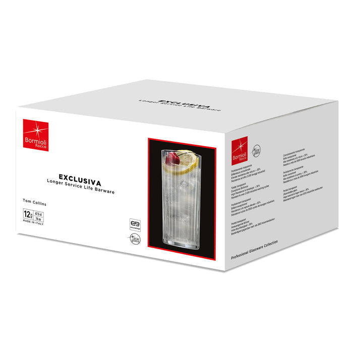 Box of Exclusiva Tom Collins glasses with a glass featuring a lemon slice on a white background.