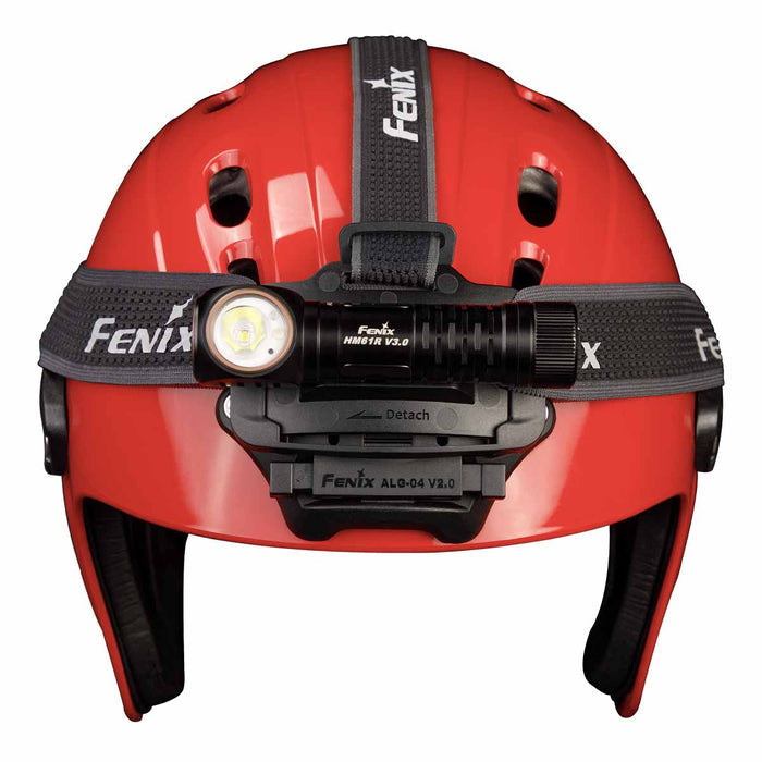 Fenix ALG-04 V2.0 attached to a red helmet with a Fenix headlamp connected to it on a white background