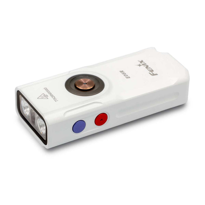 A white Fenix E06R with a front LED light bar, a central metallic power button, and two colored side buttons (blue and red) on a clean white background.