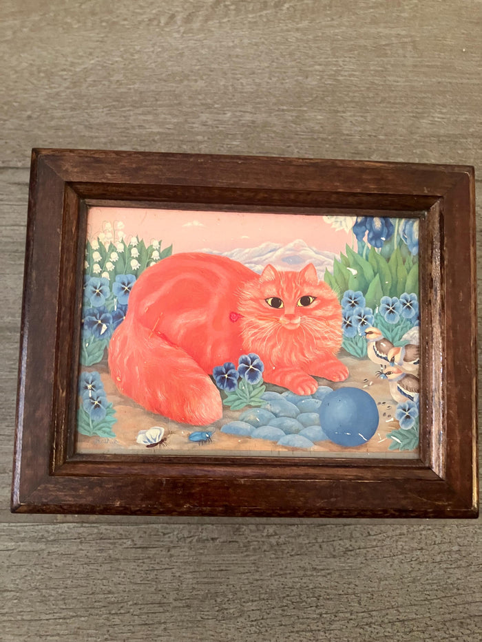 Made In Switzerland Musical Movement Box With An Orange Cat Sitting In A Flower Field With Birds